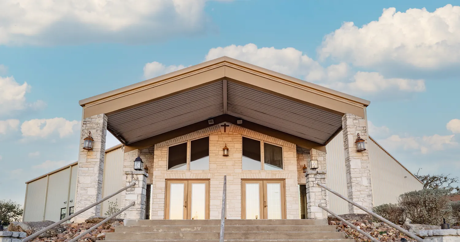 The front steps and doors of the Southern Oaks Church building