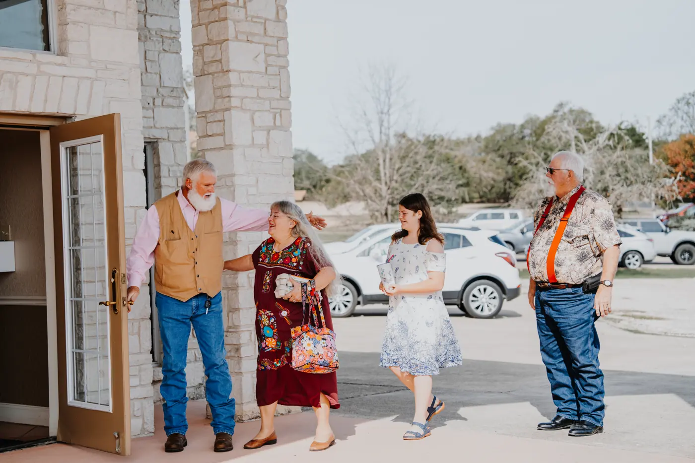 Members greeting each other outside the church doors
