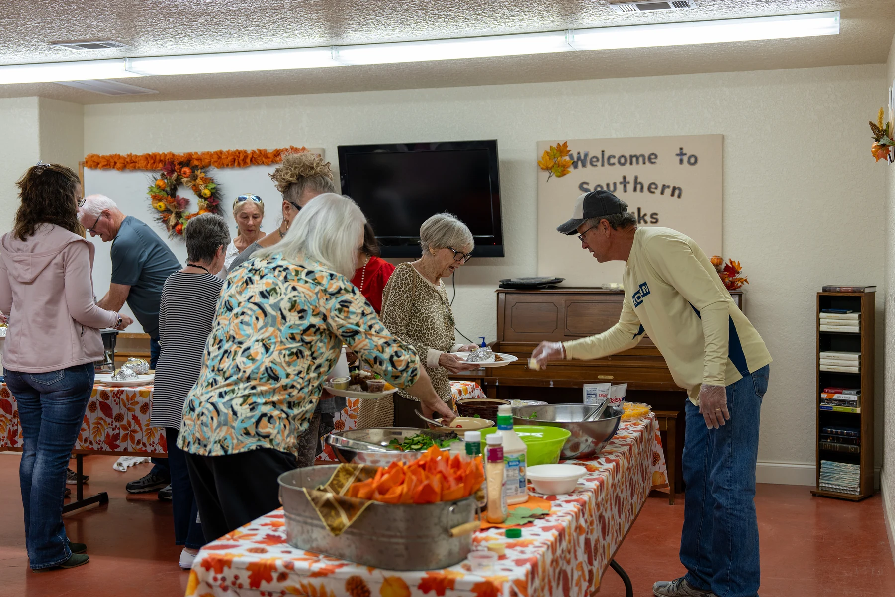 Volunteers preparing food in the church kitchen