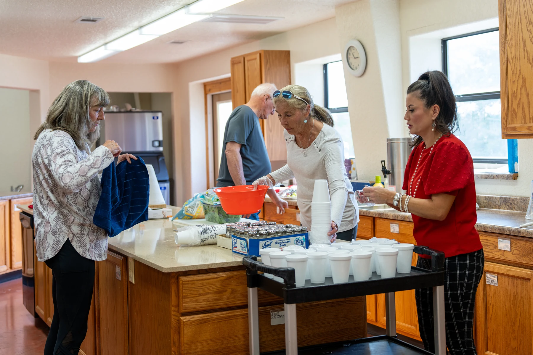 Volunteers preparing a meal in the church kitchen